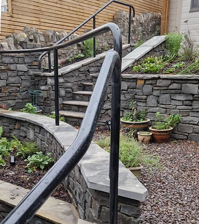 Garden handrails in landscaped garden