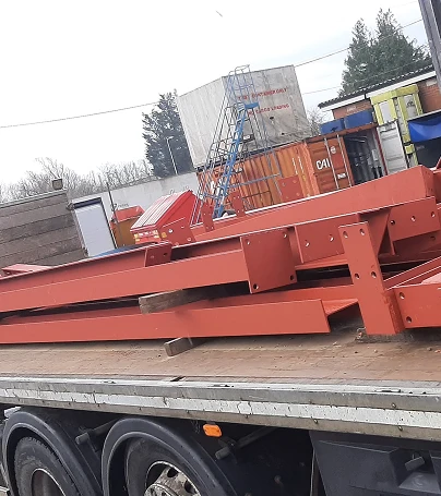 Steel beams loaded on lorry for delivery